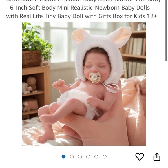 Adorable Reborn Baby Doll with Brown Hair and Cream Outfit - Picture 4 of 10